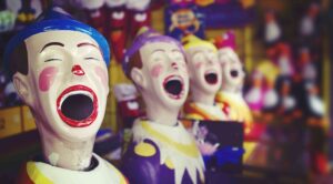 Laughing clowns at the fair ground